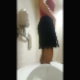 A mature girl wearing a business skirt takes a shit and piss into a toilet while being over in front of it. She turns around to reveal only her torso and cleavage. Presented in 720P vertical HD format. Over 2.5 minutes.